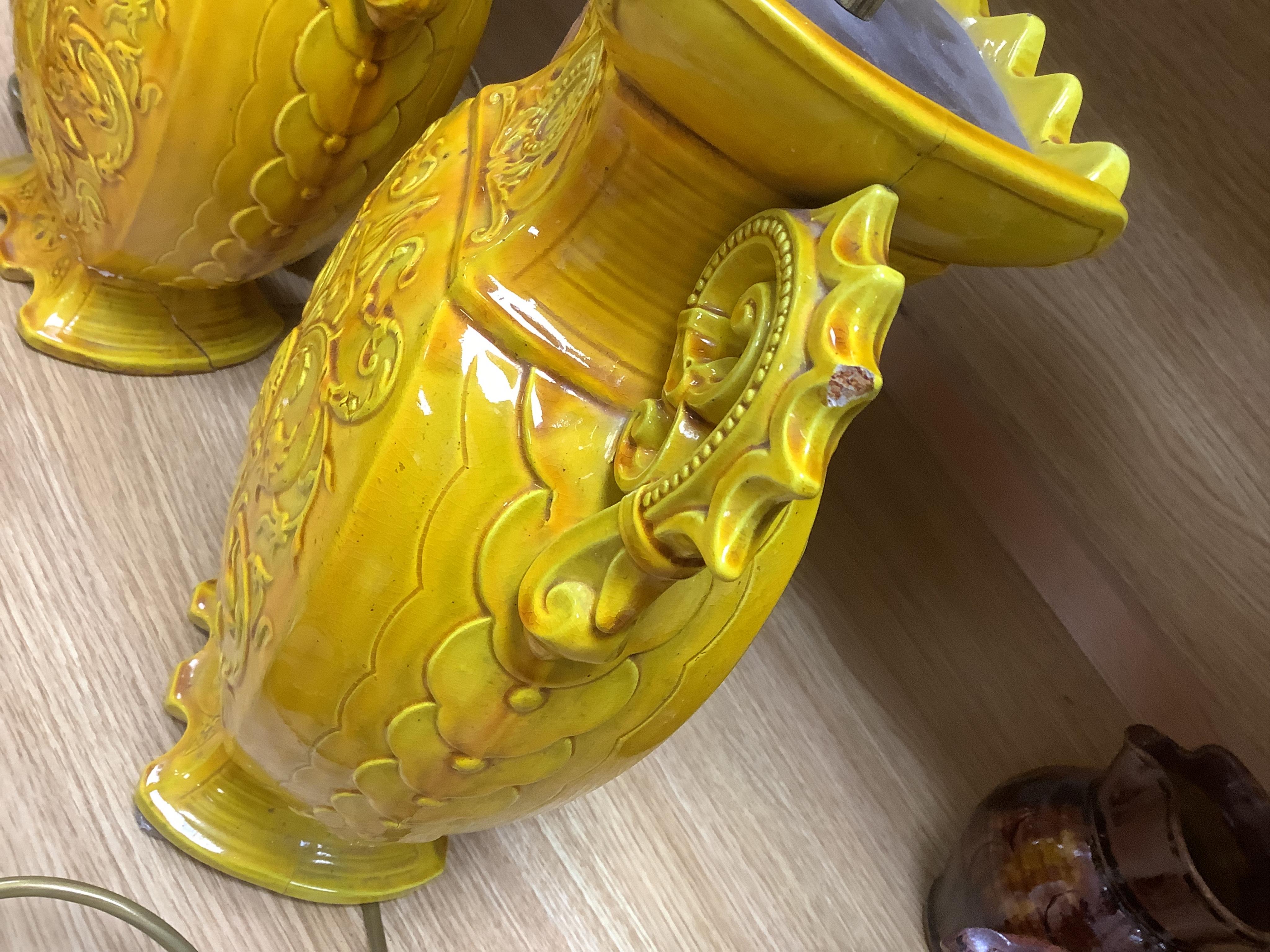A pair of late 19th century Majolica yellow glazed vases, mounted as table lamps, marked ‘W & Co’ to base, 47cm total